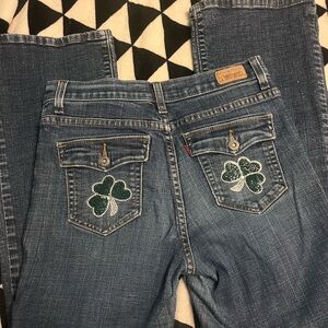 Women's 512 bootcut Jeans patched up for St. Paddy’s Day.  Size 8 S/C